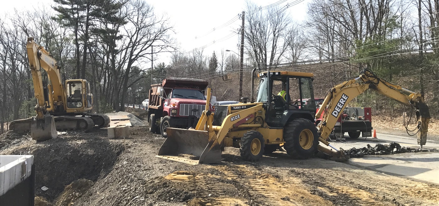 Brennan Construction, Trucks and Backhoe